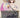 Yuna, Grand Summoner (Borderless) (Surge Foil) - Commander: FINAL FANTASY (FIC)